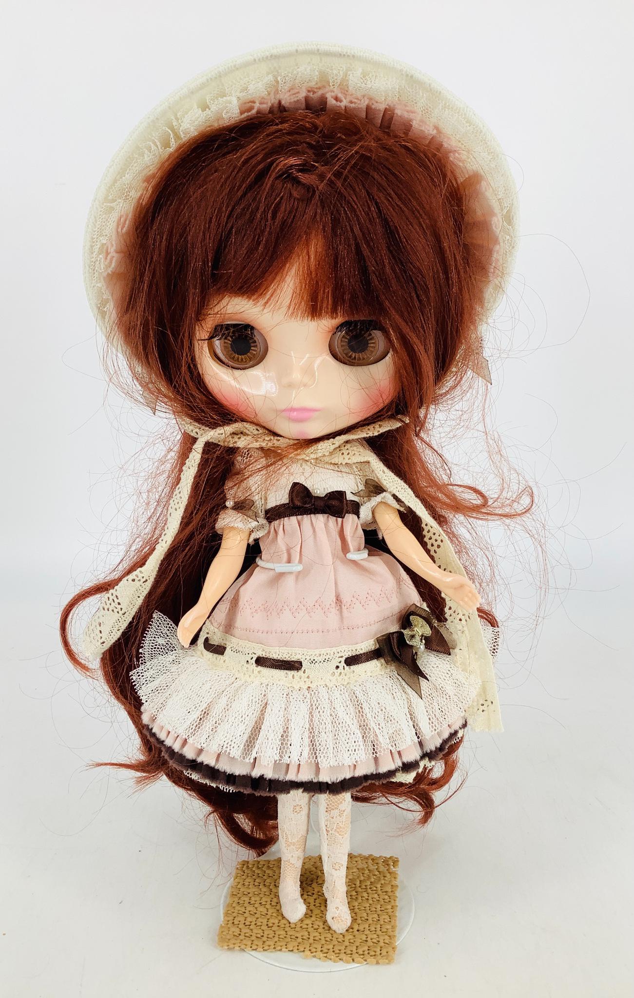 Blythe doll. 11 1/2" with rooted hair, changeable eyes. (1 of 2)