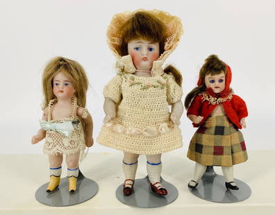 Lot (3) small all-bisque dolls. Includes 4 1/2" Kestner: Lot (3) small all-bisque dolls. Includes 4 1/2" Kestner 130 girl with one-piece head/torso, mohair wig, molded and painted facial features, string jointed arms and legs, molded and painted two-strap s