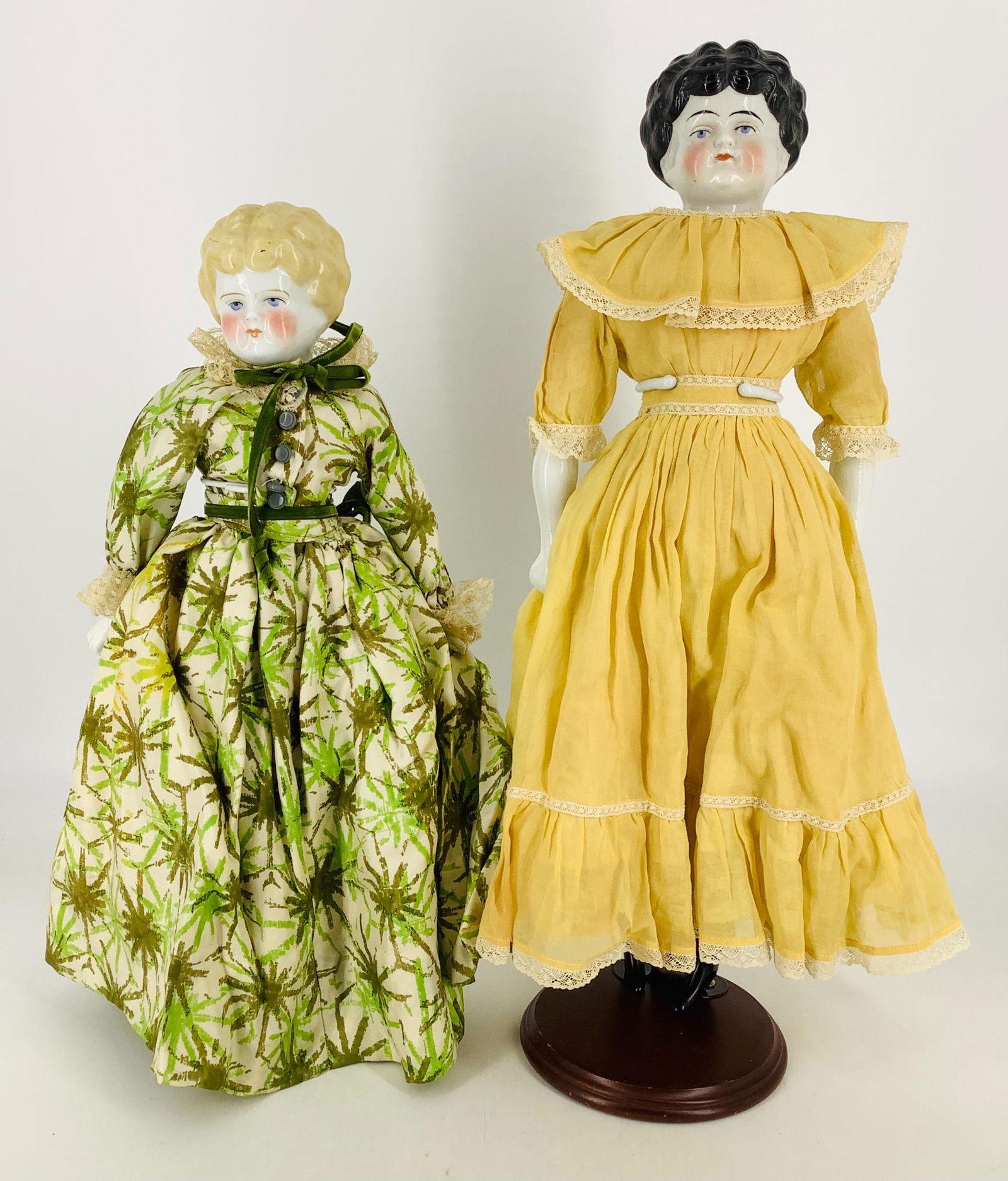 (2) China turned shoulder head dolls. Includes 16" and (1 of 4)