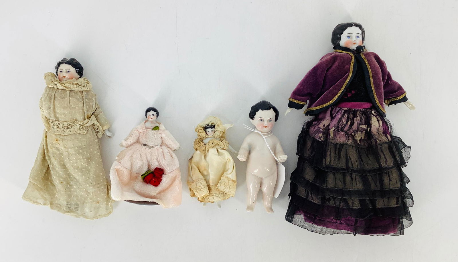 Lot (5) china dolls. Includes 8 1/2" shoulder head girl (1 of 1)