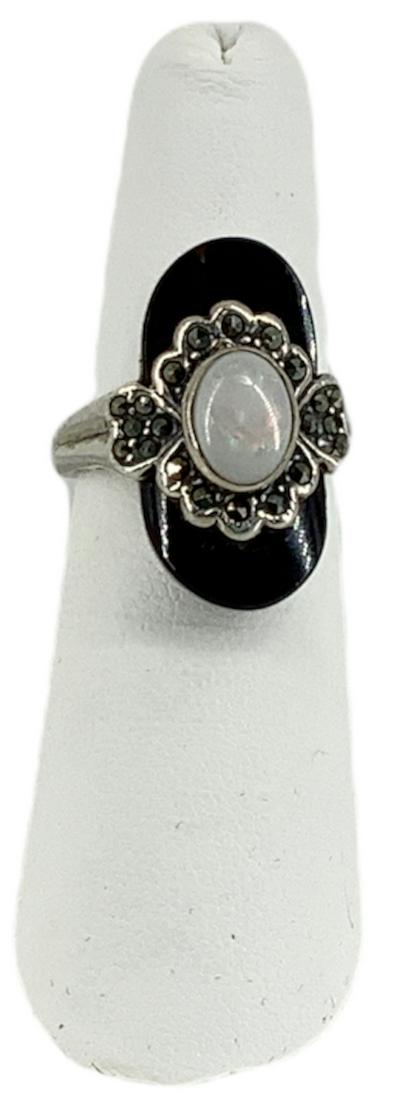 Sterling Silver Onyx, Opal & Marcasite Ring: Sterling Silver Onyx, Opal & Marcasite Ring Size 6, tapered shank ring featuring an opal center stone (8.3mm x 5.7mm) embellished with marcasite accents and finished with onyx at the top and bottom of