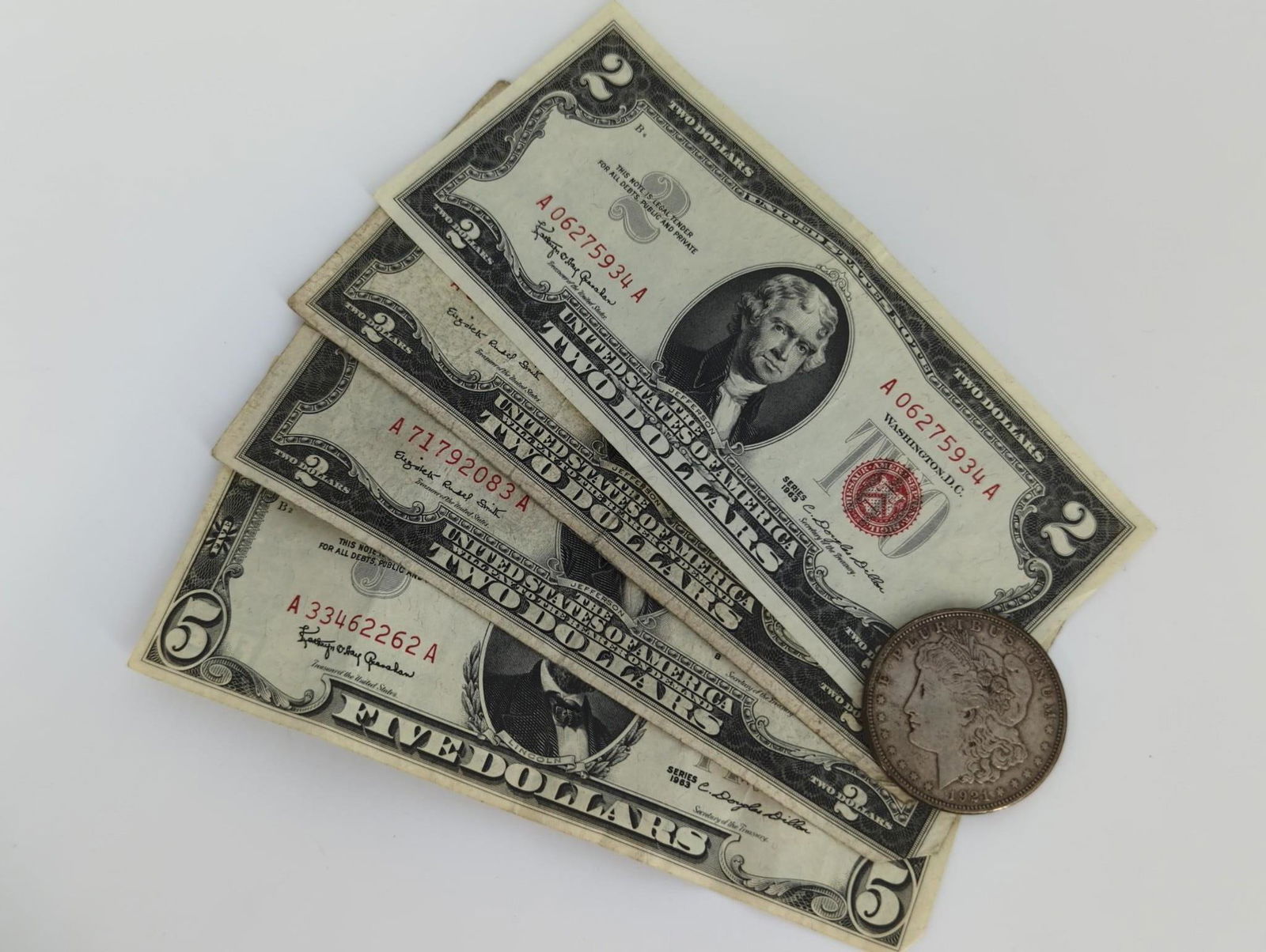 One U.S. Morgan Silver Dollar, Three $2.00 Red Seal (1 of 9)