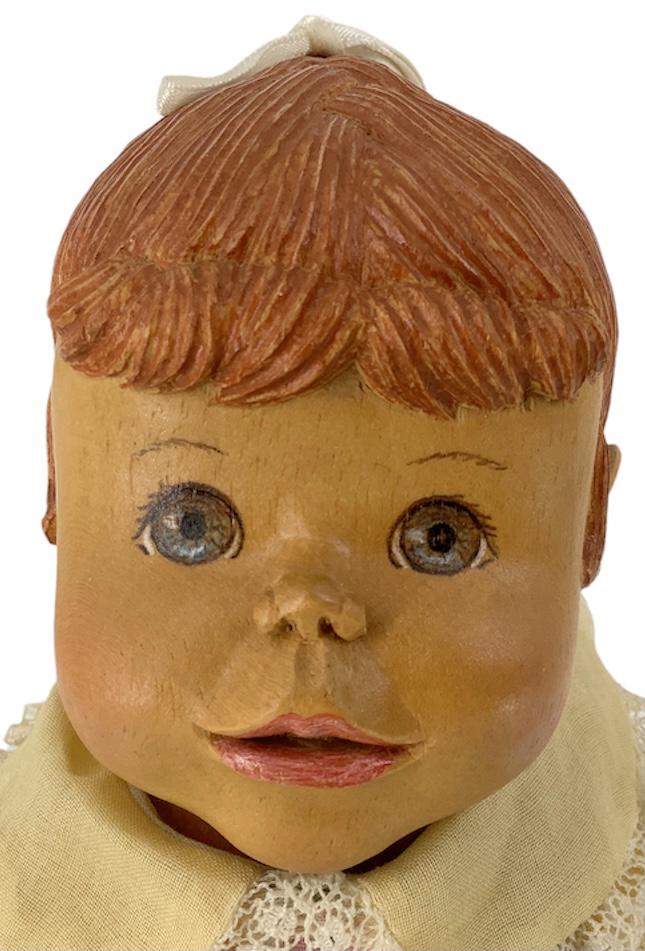 Wood artist doll "Bobbi-Cara" by Bob Beckett.: Wood artist doll "Bobbi-Cara" by Bob Beckett. One-of-a-kind 12" flange head girl with carved and painted hair and facial features, on cloth body with carved arms and legs.