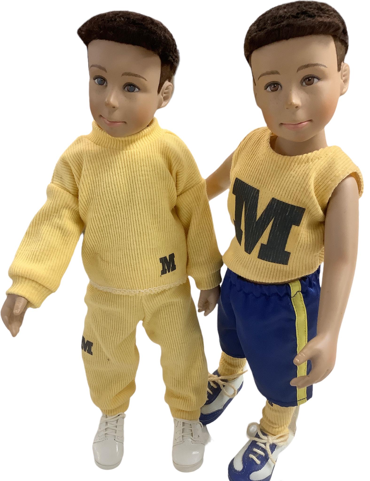 Lot of 2 approx 12" hard vinyl sports themed boy dolls (1 of 2)