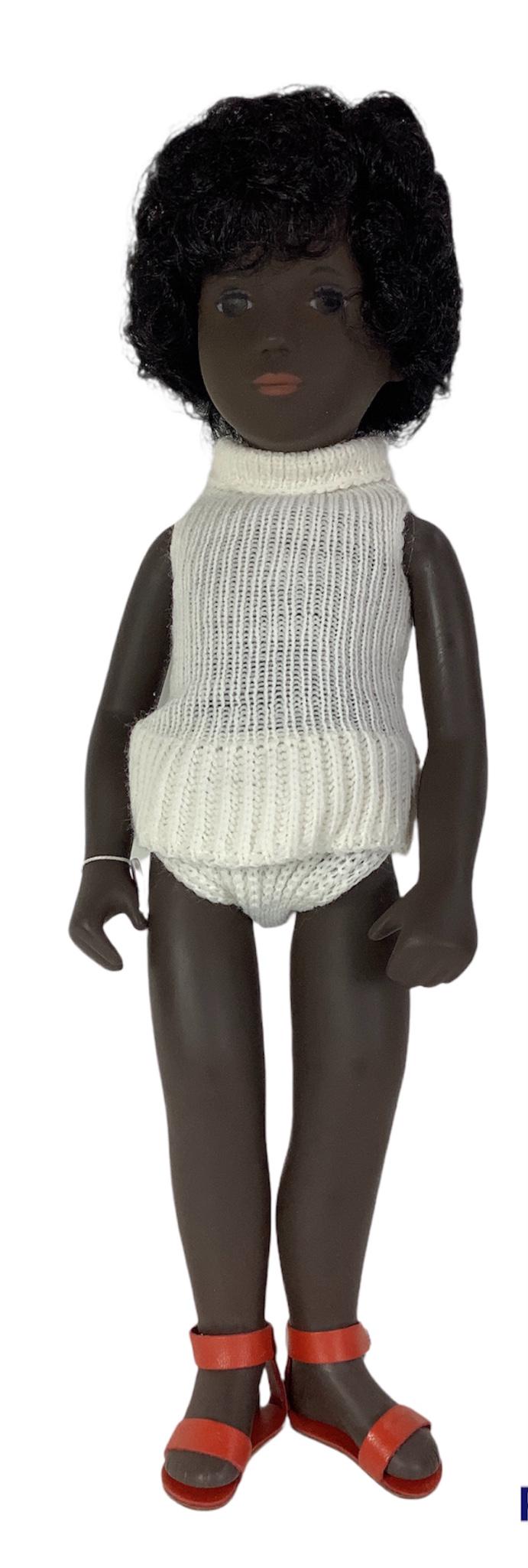16" vinyl Sasha Black Girl Cora (109) w/tag, has: 16" vinyl Sasha Black Girl Cora (109) w/tag, has painted facial features and is in good condition. Box has tears, rips, shelf wear and cellophane is missing.