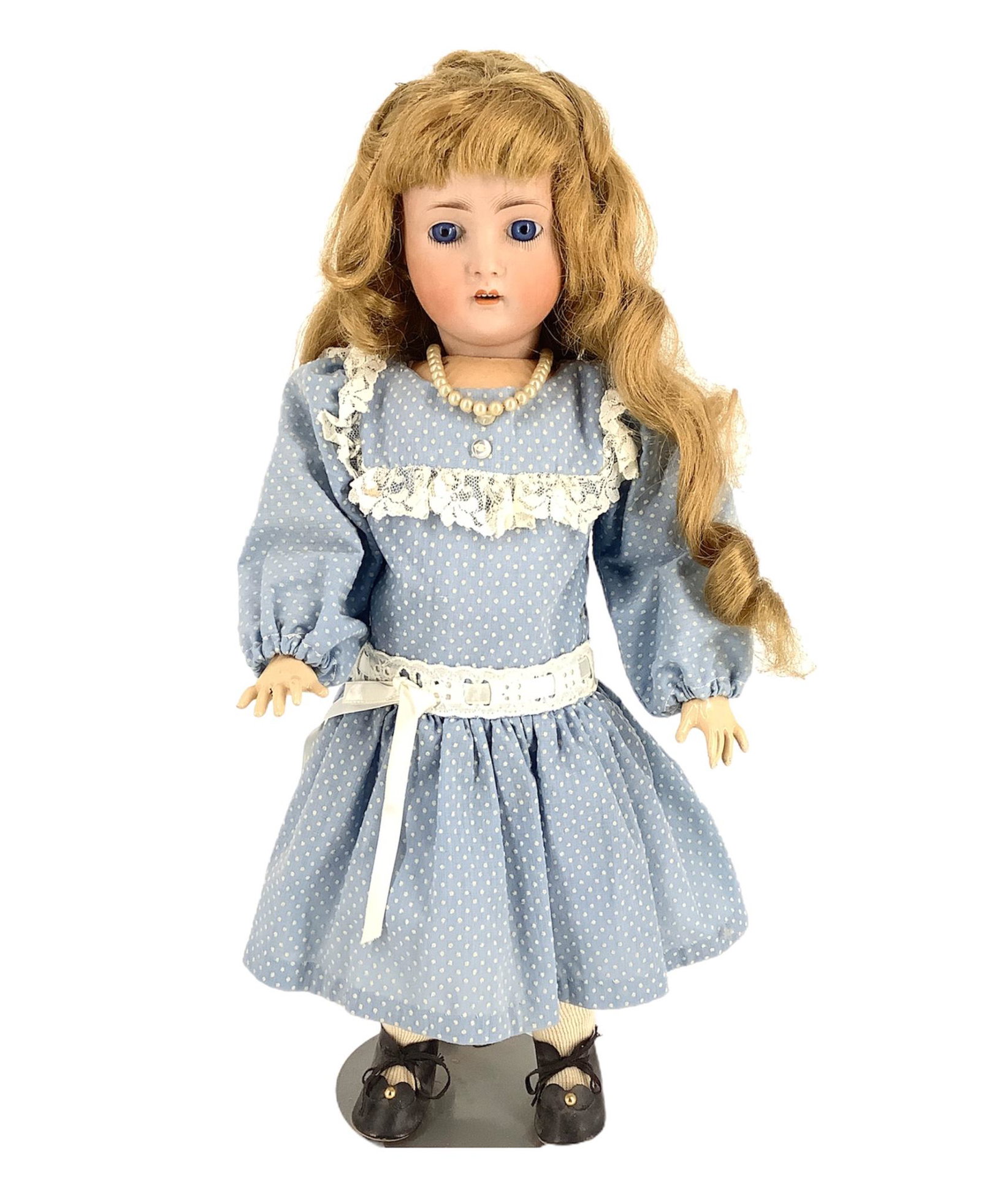 Doll marked Germany, 136/5 (Hertel Schwab & Co), @: Doll marked Germany, 136/5 (Hertel Schwab & Co), @ approx 18" tall. Blue glass eyes have been set, head has wig pulls and wig is loose. She is jointed and has an open mouth w/four teeth. Newer dress.