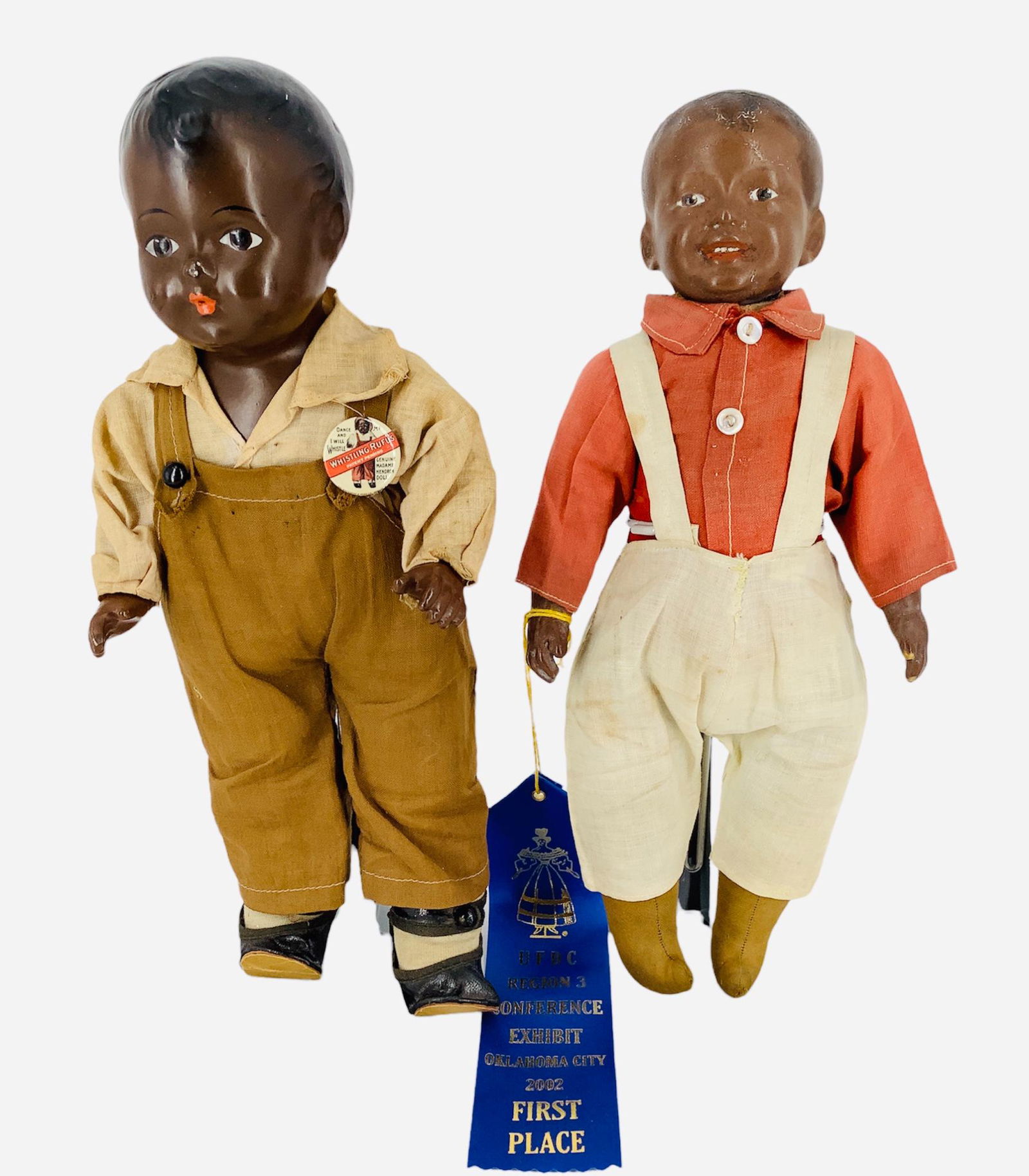 Lot of 2 dolls, doll in overalls is painted plastic and (1 of 3)