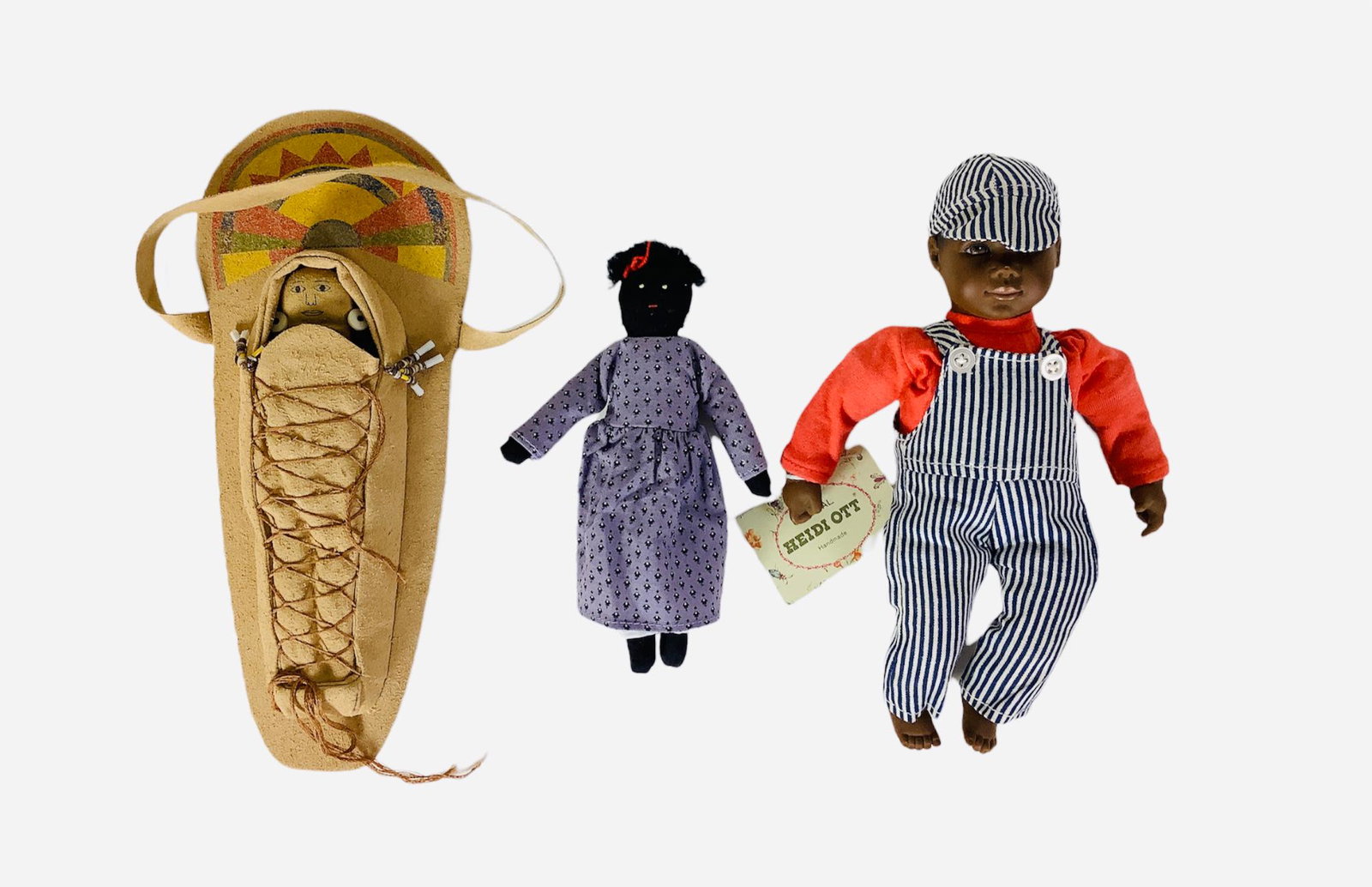 Lot of (3) dolls made of porcelain, cloth and leather, (1 of 1)