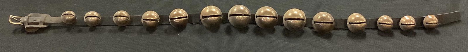 60" sleigh bell strap w/ 14 bells. Bells range from (1 of 7)