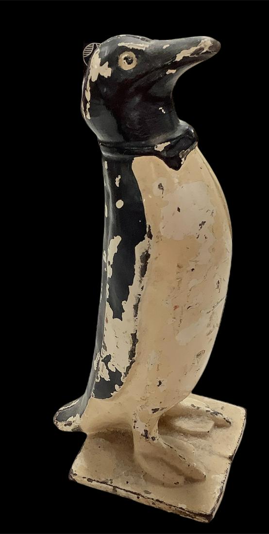 Penguin door stop made of cast iron 10.5 tall. (1 of 1)