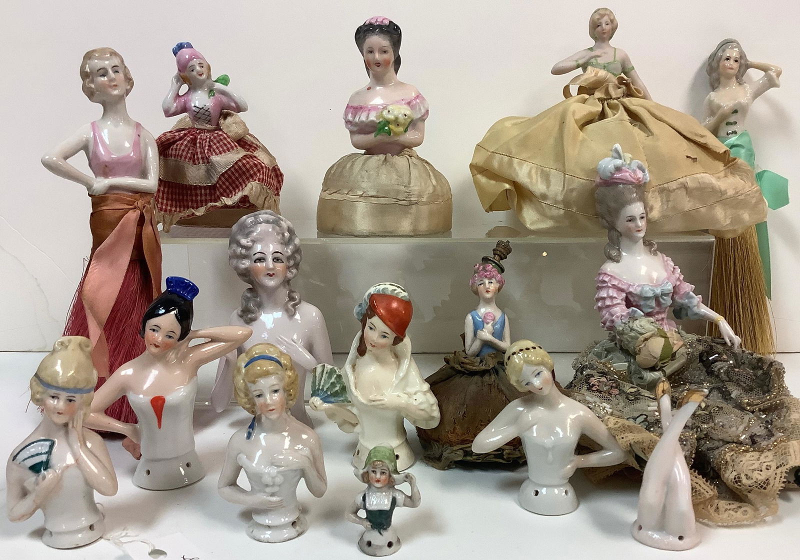 Two porcelain half doll whisk brooms, 4 porcelain half (1 of 1)