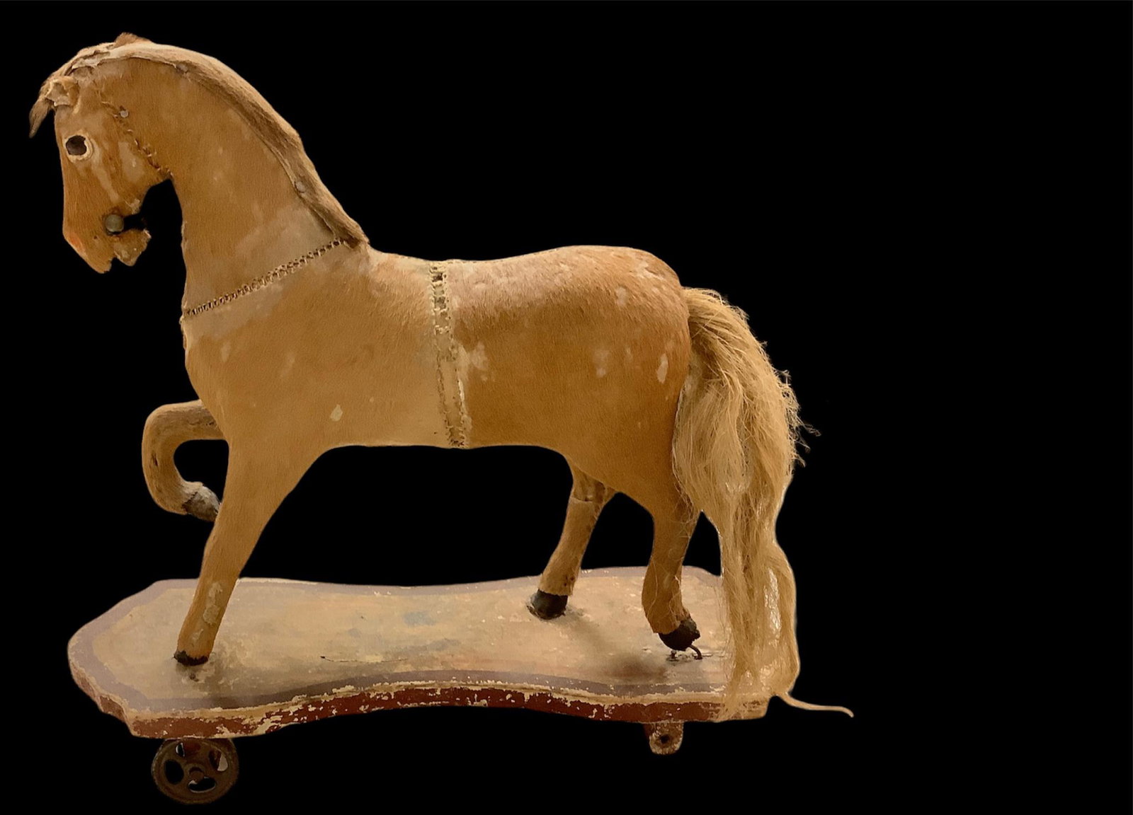 Toy Pull horse made of wood and cow hide. one wheel (1 of 1)