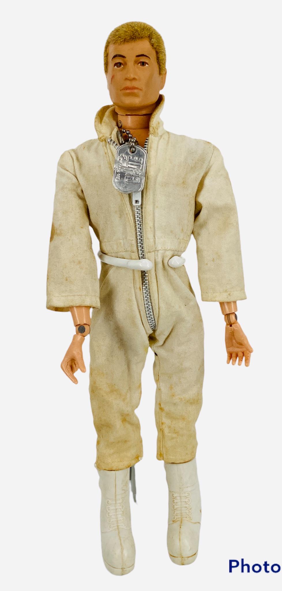 Hasbro Talking G.I. Joe Astronaut. 12" multi-jointed: Hasbro Talking G.I. Joe Astronaut. 12" multi-jointed doll with "life like hair", pull string for talking mechanism is faint but works. Comes in original box with extra outfit. Box is damaged, staining