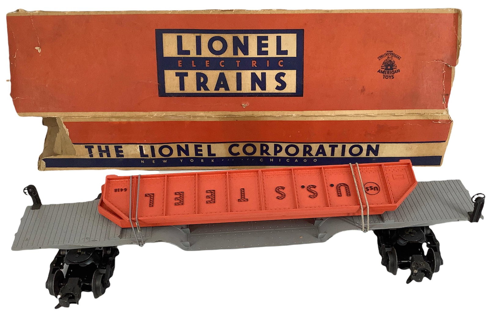 Lionel postwar 6418 machinery car with 2 steel girders,: Lionel postwar 6418 machinery car with 2 steel girders, pinkish orange U.S. steel girders, flattened box.