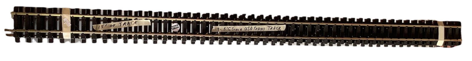 Four sections of 5â€™ G-scale track, USA trains (1 of 1)
