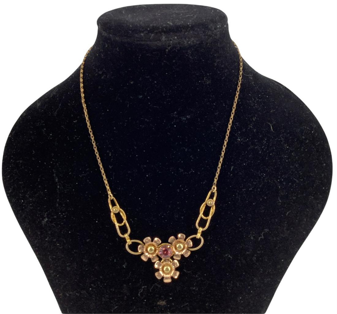 Vintage Necklace From Van Dell Co.: Vintage Necklace From Van Dell Co. 16" choker length gold filled necklace featuring a "v" shaped center with floral adornments accented with a pink rhinestone in the center, stamped, tested & signed.