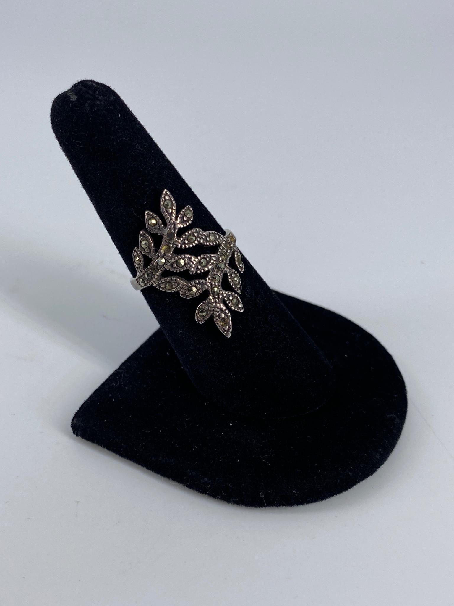 Sterling Marcasite Ring: Sterling Marcasite Ring Size 7, freeform shank design, stamped/tested, 0.135 troy ounces, marcasite/pyrite.