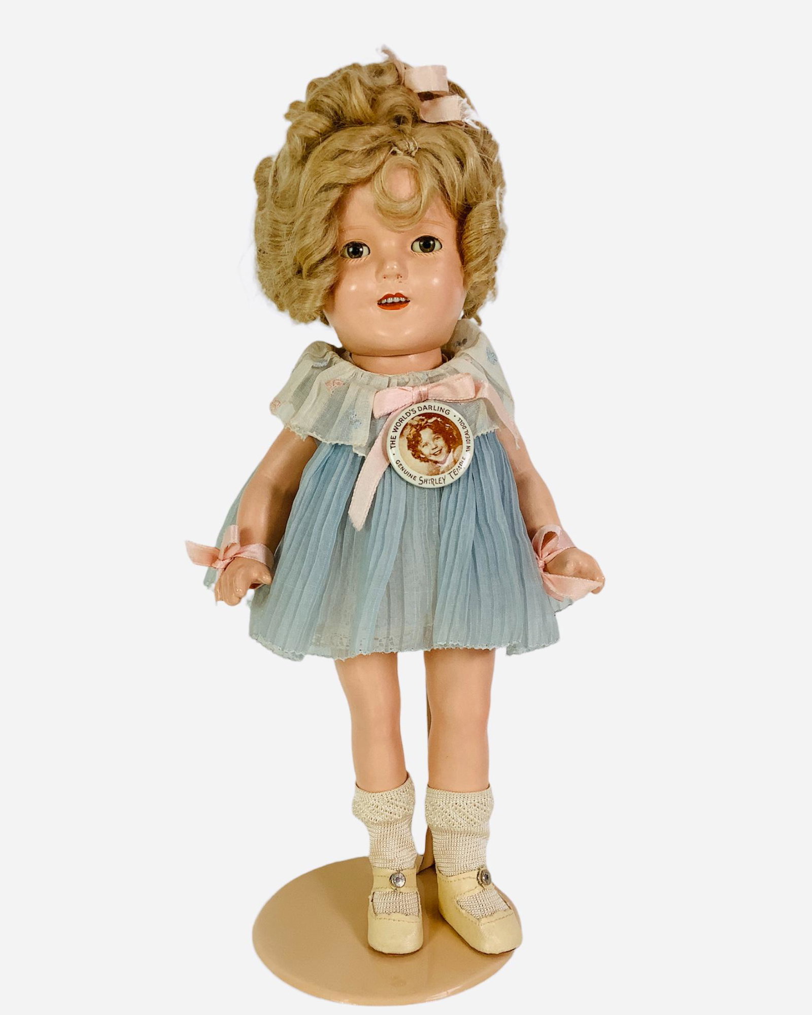 Ideal composition Shirley Temple. 13" all original doll with mohair wig, sleep eyes, open mouth with: Ideal composition Shirley Temple. 13" all original doll with mohair wig, sleep eyes, open mouth with teeth, on five-piece body marked "Shirley Temple 13". Shirley wears her tagged NRA dress, underclot