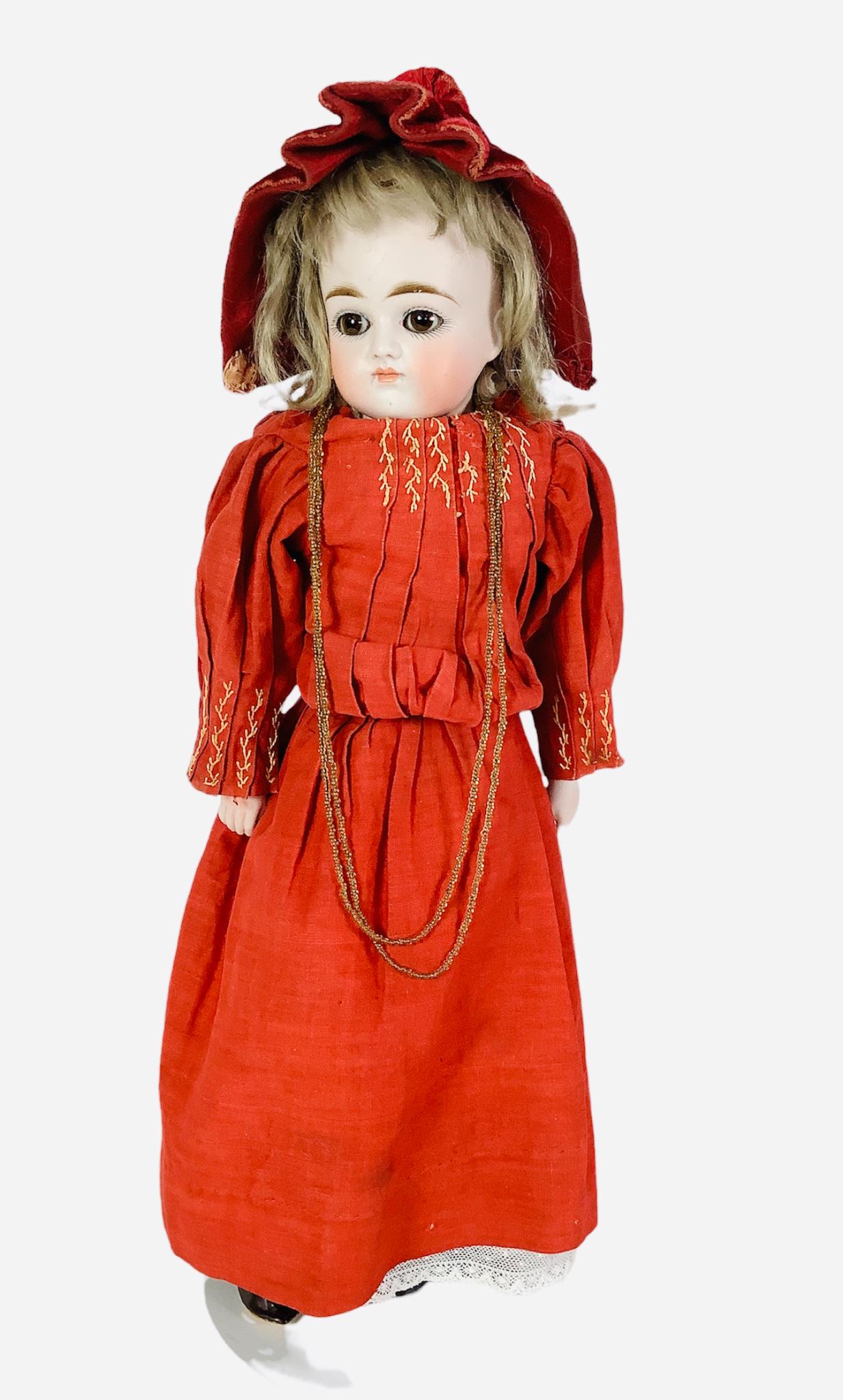 Kestner bisque turned shoulder head girl. 16" doll with mohair wig over intact plaster pate, (1 of 3)