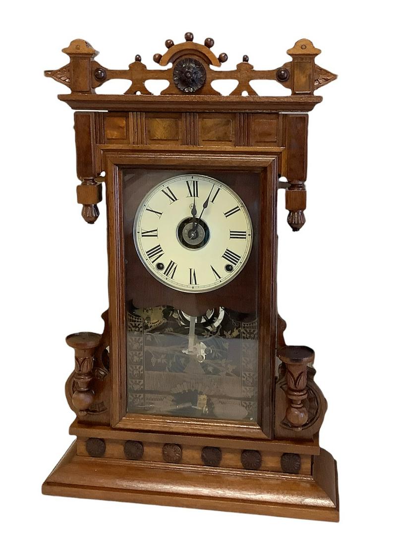 Seth Thomas 8-day clock with alarm. Measuring 22.75" high x 14.75" wide. Pendulum and key present (1 of 3)