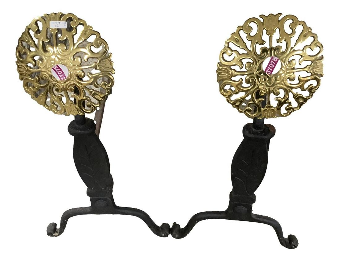 Brass and iron andirons, 23" tall.: Brass and iron andirons, 23" tall.