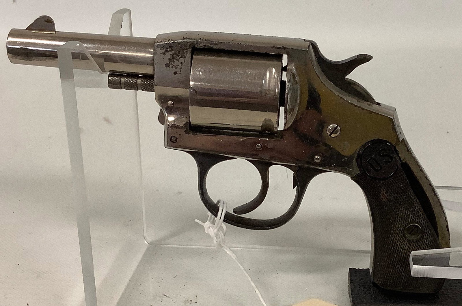 U.S. Revolver Co. .32 Caliber Revolver SN: 7962, broken grip., Be aware of additional charges as: U.S. Revolver Co. .32 Caliber Revolver SN: 7962, broken grip. Be aware of additional charges as shipping restrictions require all handguns to ship via Overnight UPS, Adult Signature required, to a FFL