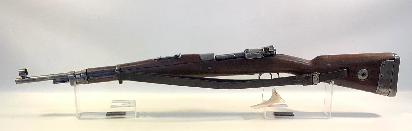 Mauser Model G33/40 .8mm Caliber 1940 788 945 (Stamped) Bolt Rifle SN: 6765, including sling., By: Mauser Model G33/40 .8mm Caliber 1940 788 945 (Stamped) Bolt Rifle SN: 6765, including sling. By bidding on this lot buyer accepts responsibility of knowledge of State and Federal laws for their state