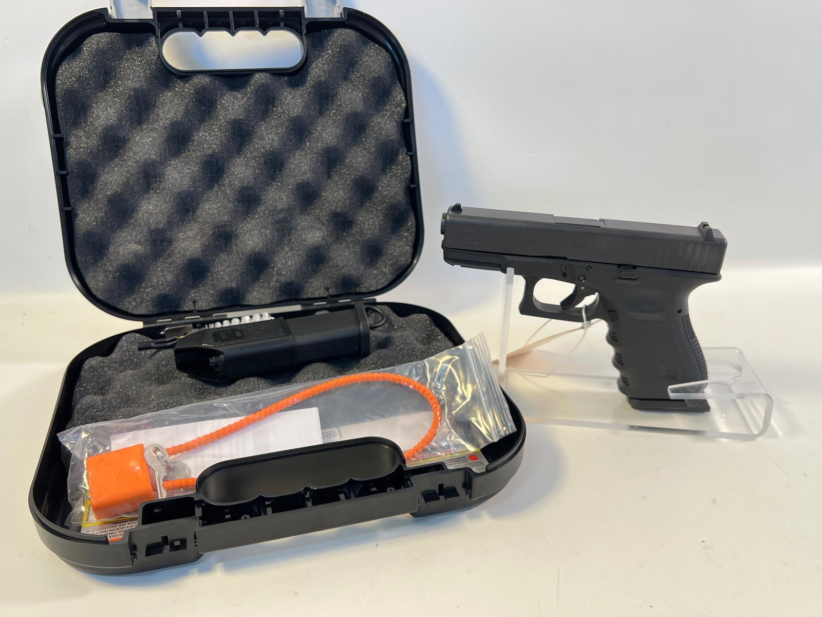 Glock Model 19 .9mm Caliber Semi-auto Pistol SN: BDBS089, including 2 magazines and hard case., Be: Glock Model 19 .9mm Caliber Semi-auto Pistol SN: BDBS089, including 2 magazines and hard case. Be aware of additional charges as shipping restrictions require all handguns to ship via Overnight UPS, A