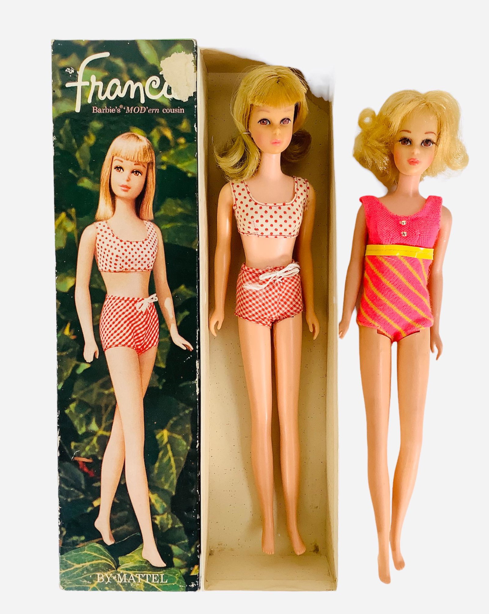(2) Francie's with one in her original box and a twist and turn Francie with shorter blond: (2) Francie's with one in her original box and a twist and turn Francie with shorter blond semi-curled. The Francie in the box has her original polka dot/gingham bathing suit & she has the string in t
