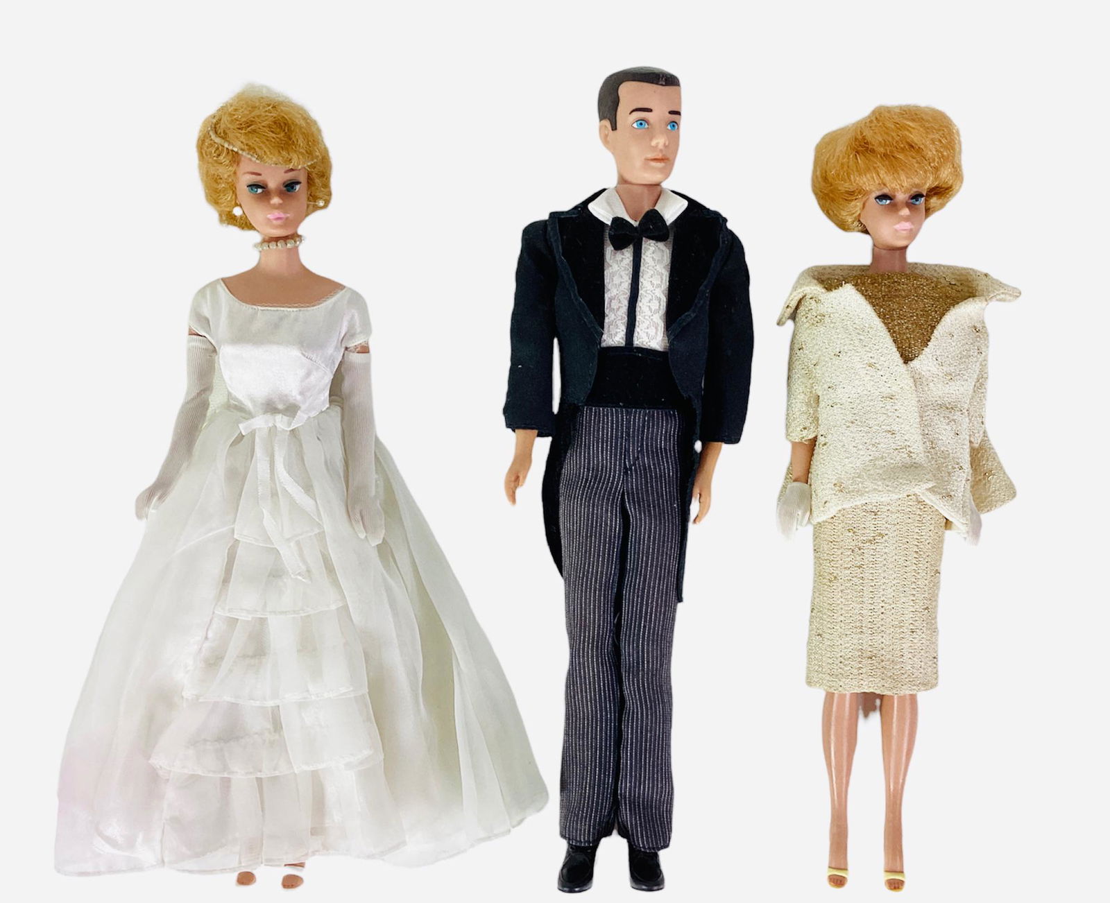 (3) Ken & Barbies (1) A bendable dark painted hair Ken is wearing a newer Tuxedo from the 1980's. (1 of 1)