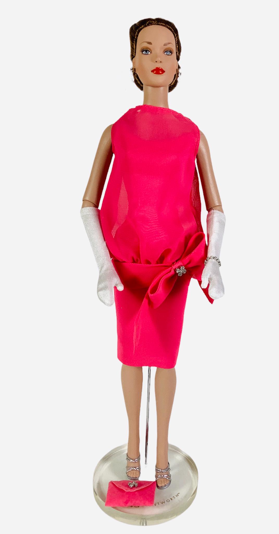 16" Tonner doll Redressed in pink dress, silver shoes, white gloves and pink purse with extra set of (1 of 2)