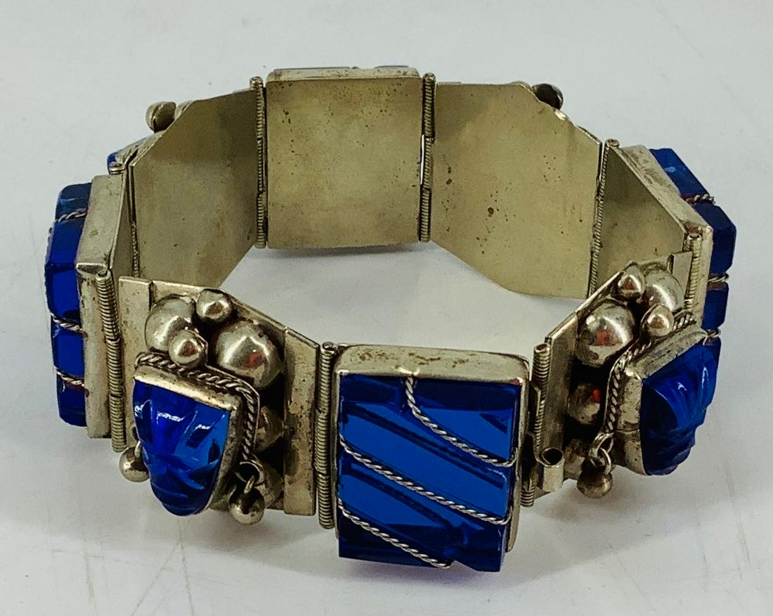 Alpaca "Silver" Mayan Style Bracelet with Glass Beading: Alpaca "Silver" Mayan Style Bracelet with Glass Beading 7.75" in length, base metal alpaca "silver" composition, box clasp closure, made in Mexico, links measure up to 29.75mm in width. Blue glass bea