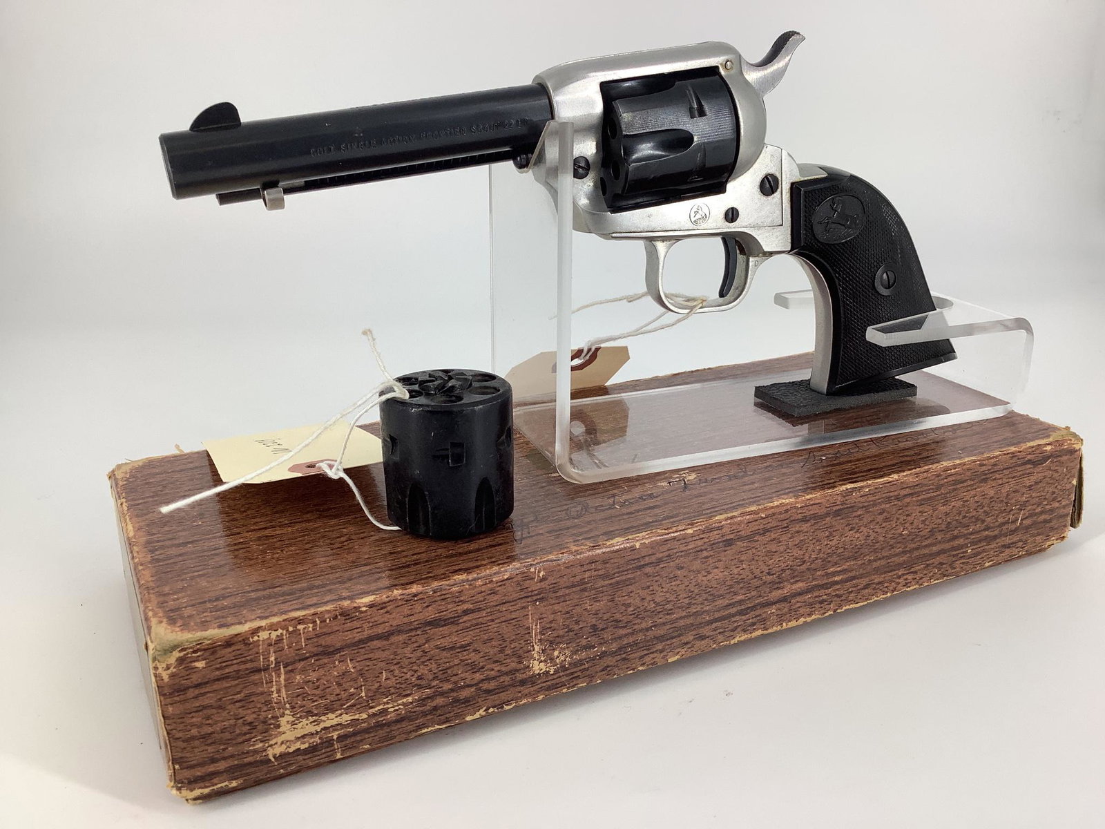 Colt Model Frontier Scout Single Action .22 LR/.22 Mag Caliber Revolver SN: 37849F, including 2: Colt Model Frontier Scout Single Action .22 LR/.22 Mag Caliber Revolver SN: 37849F, including 2 cylinders and original box. Be aware of additional charges as shipping restrictions require all handguns