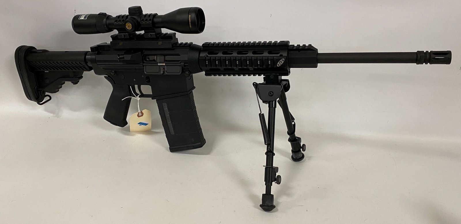 DPMS, Model: LR-308, .308 caliber semi auto rifle, SN: 157294. With scope and bipod., By bidding on: DPMS, Model: LR-308, .308 caliber semi auto rifle, SN: 157294. With scope and bipod. By bidding on this lot buyer accepts responsibility of knowledge of State and Federal laws for their states require