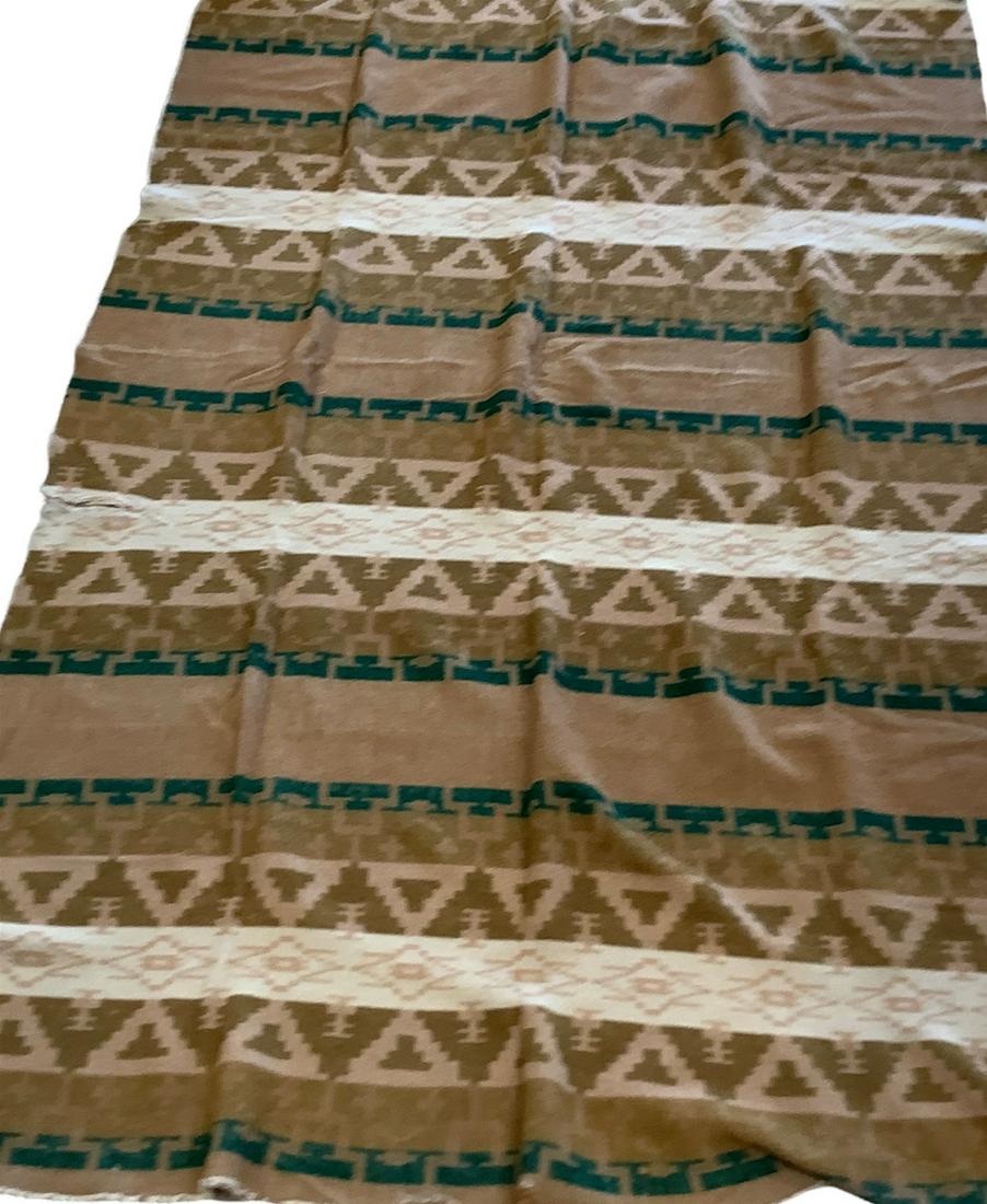 Indian style design blanket. Has wool in it. There is tier and a couple holes. Used.: Indian style design blanket. Has wool in it. There is tier and a couple holes. Used.