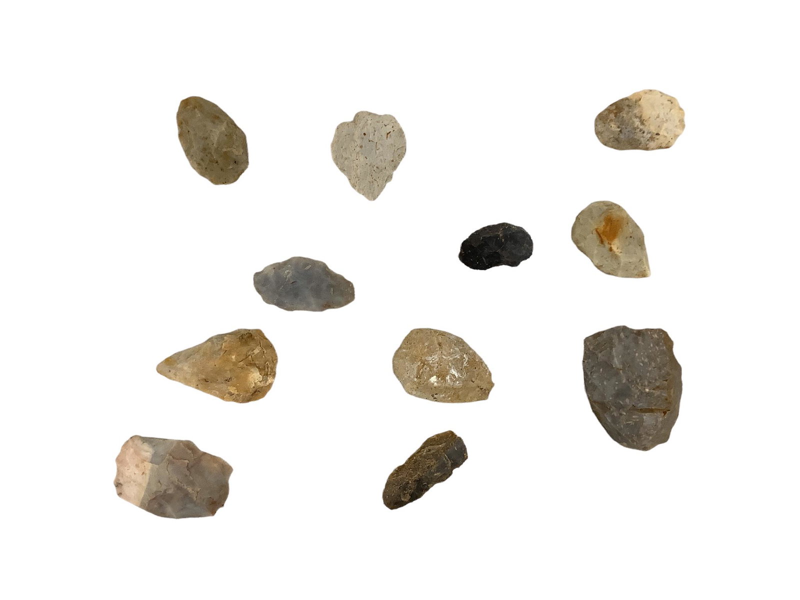 Lot of 11 pieces of flint points and blades in 12" x 16" display case marked Adena.: Lot of 11 pieces of flint points and blades in 12" x 16" display case marked Adena.