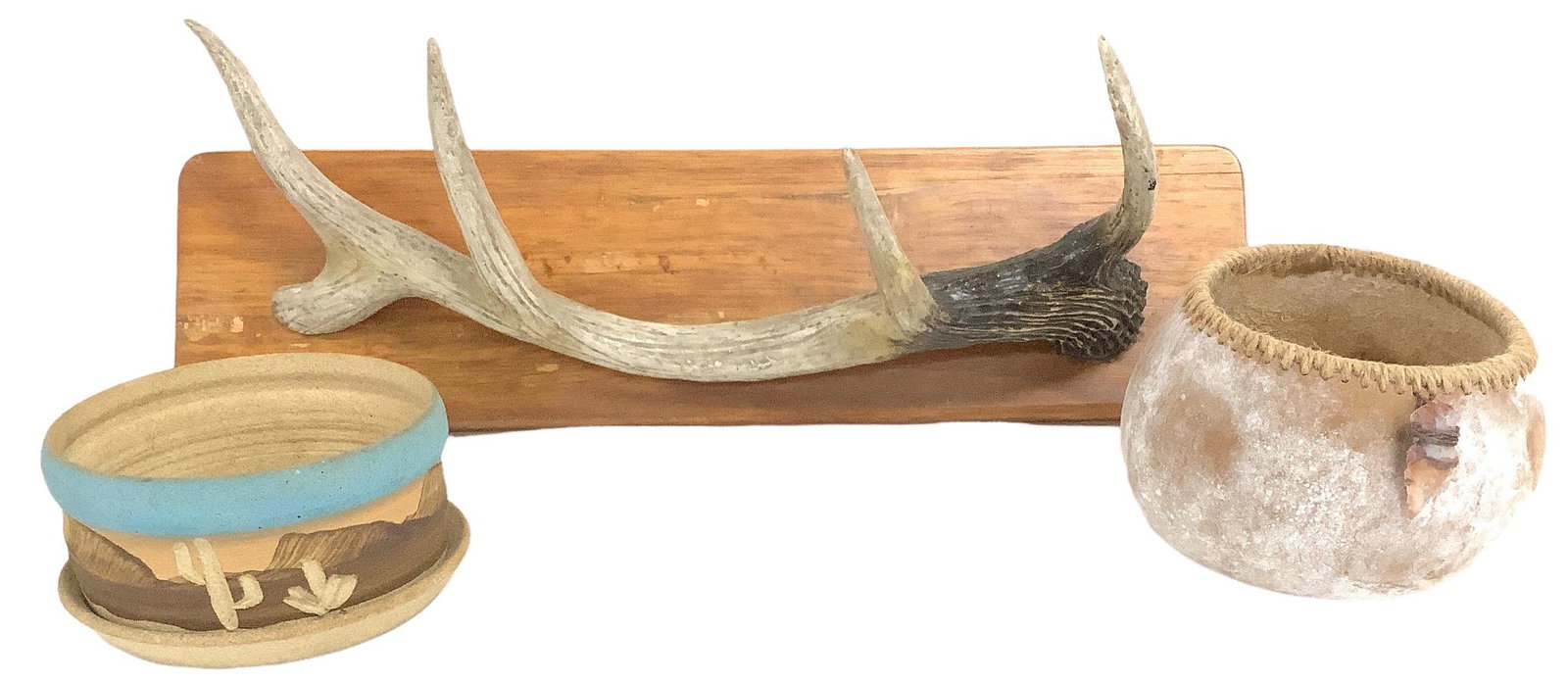 Lot including a gourd bowl with jute finished edge and decorated with a flint point, 4.25"diameter,: Lot including a gourd bowl with jute finished edge and decorated with a flint point, 4.25"diameter, an unglazed stoneware planter, 4.75" diameter, and a hat rack with faux antler mounted on wood, 17.7