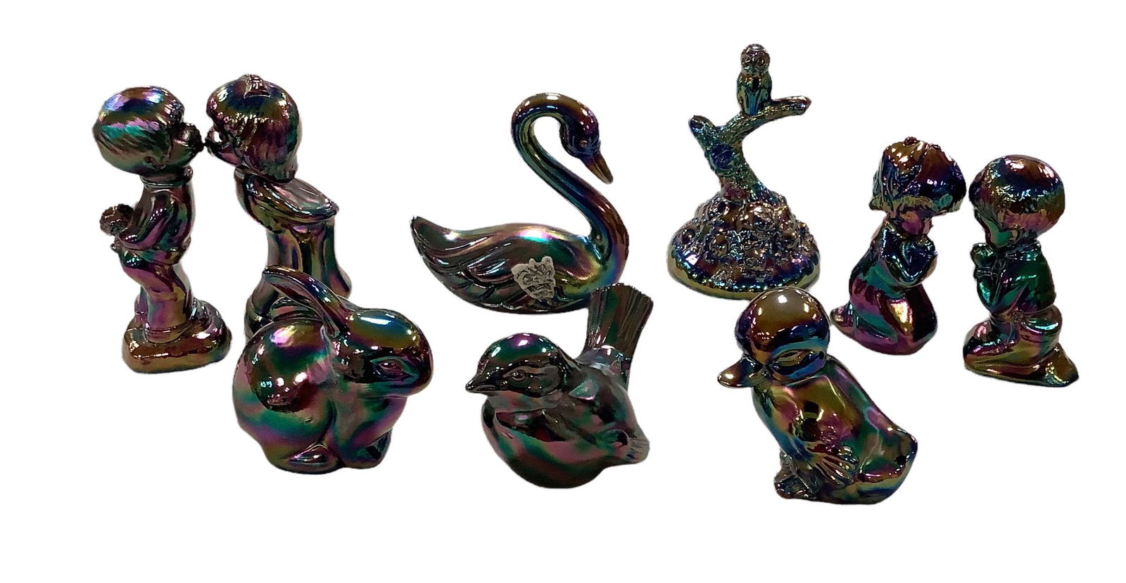Fenton Amethyst Carnival Glass figurines count of 9. First kiss figurines 4 1/2” tall. (1 of 1)