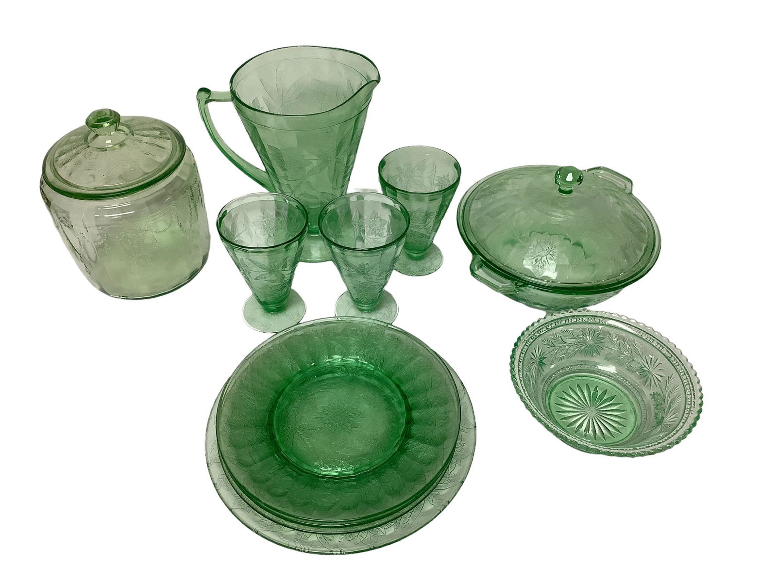 Lot of vintage green depression glass including a pitcher with 3 juice tumblers, three 8" salad (1 of 1)