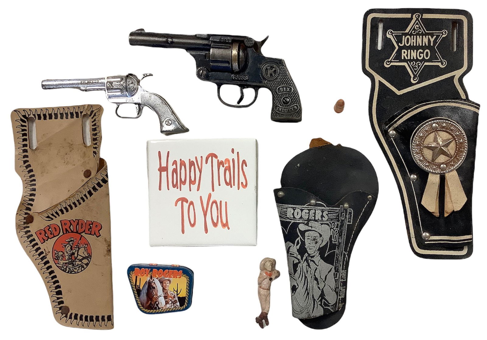 Lot of 2 toy guns, 3 toy holsters, a cowboy pin, and more. (1 of 1)
