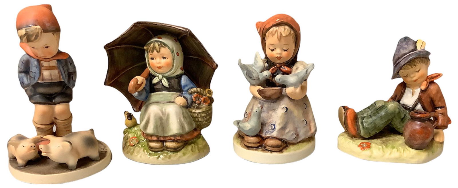 Lot of 4 Hummel figurines including Smiling Through, Cinderella, Coffee Break and Farm Boy, ranging (1 of 2)
