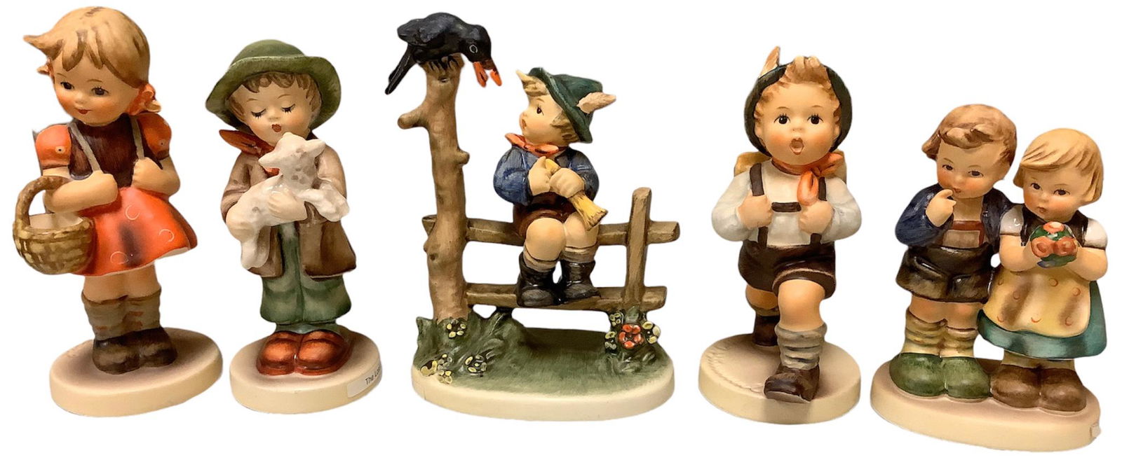 Lot of 5 Hummels including mischief maker, the lost sheep, school girl, school boy & we (1 of 2)