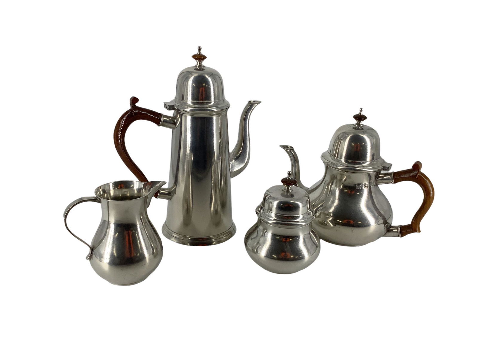4 piece pewter coffee & tea set marked "John Somersault Brazil". Includes coffee pot, teapot, (1 of 1)