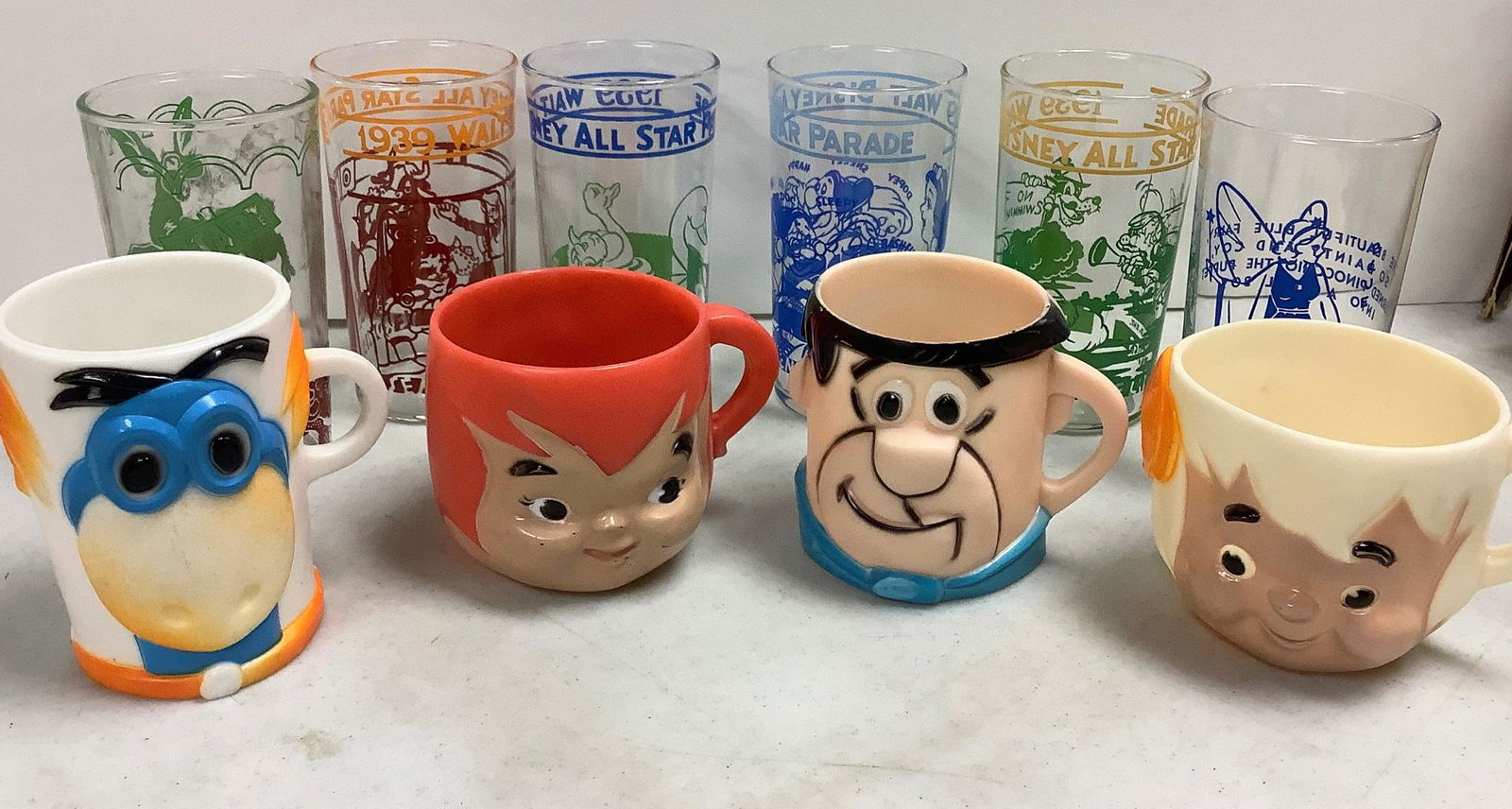 Set of Vintage Flinstones vitamins cups 3" - 3 3/4" tall. Set of collectible drinking glasses Walt (1 of 3)