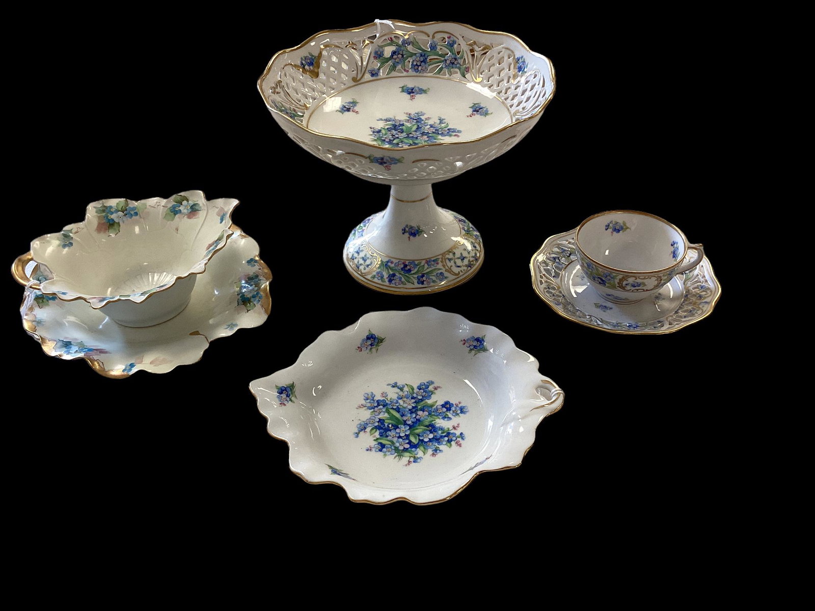 Lot of (4) including porcelain "Forget Me Not" serving bowl, cup, saucer & candy dish and a: Lot of (4) including porcelain "Forget Me Not" serving bowl, cup, saucer & candy dish and a porcelain cup and saucer.