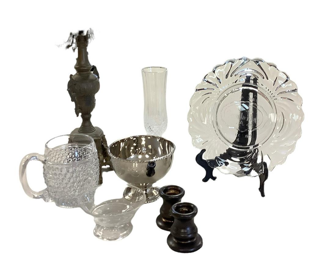 Cambridge collectors plates count of. 4. Crystal wine champagne glasses 8.5" high count of 10 . Six: Cambridge collectors plates count of. 4. Crystal wine champagne glasses 8.5" high count of 10 . Six brass arm candle holder one broken on a 17" high Candelabra. Some miscellaneous items