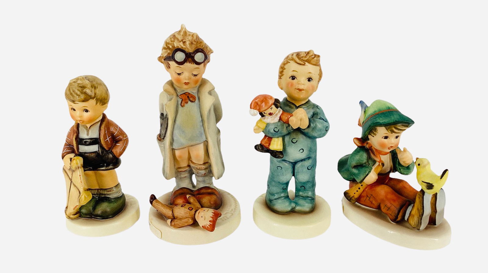 4 H.J. Hummel Goebel figurines, Windy Wishes 4", with box, A Prayer for Everyone 4.25" with box,: 4 H.J. Hummel Goebel figurines, Windy Wishes 4", with box, A Prayer for Everyone 4.25" with box, Doctor 4.5", Singing Lesson 3 3/4".