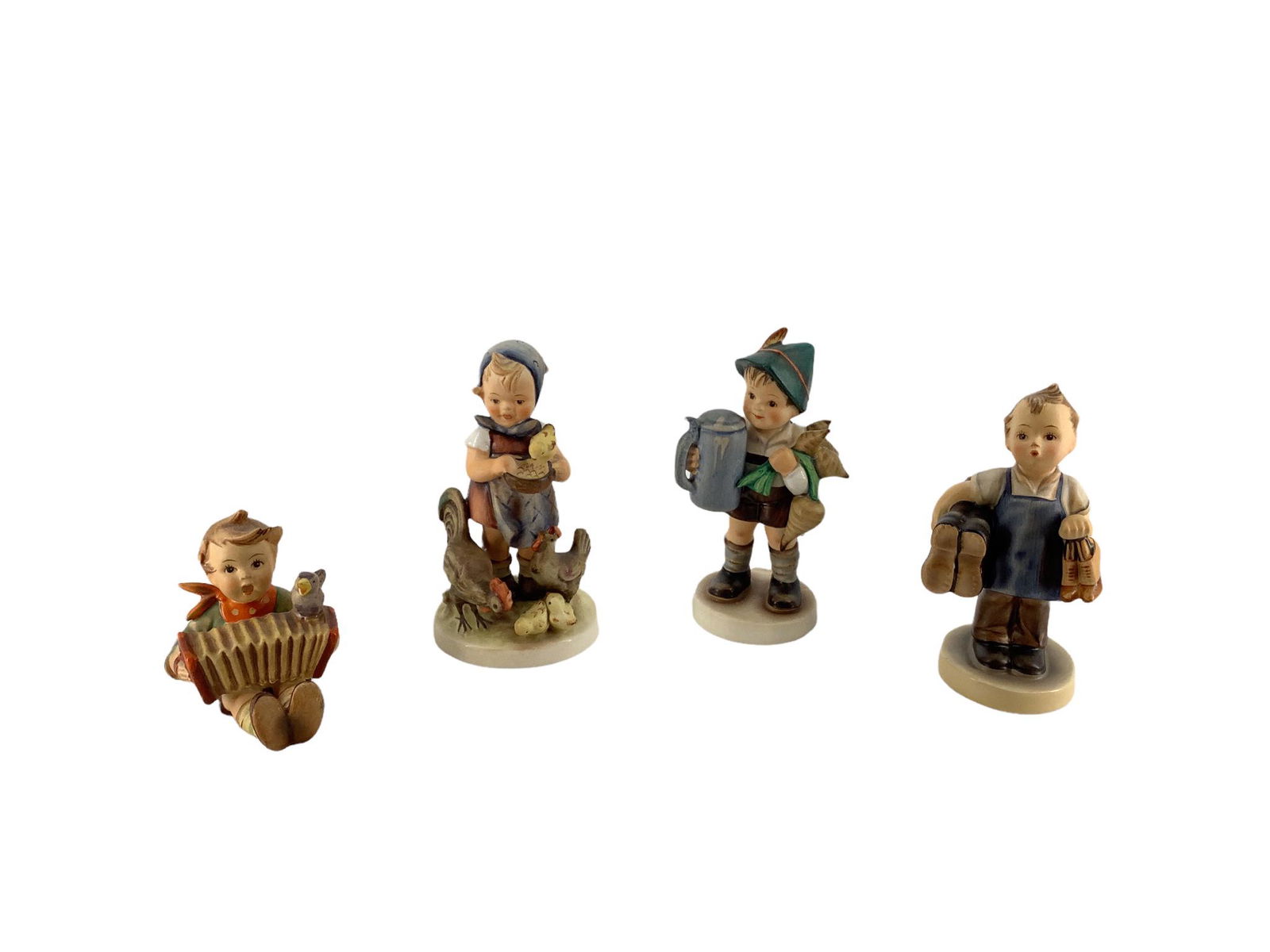 Lot of 4 Hummel figures which include "Feeding Time", "For Father ", "Accordion Boy", and "Boots", (1 of 3)