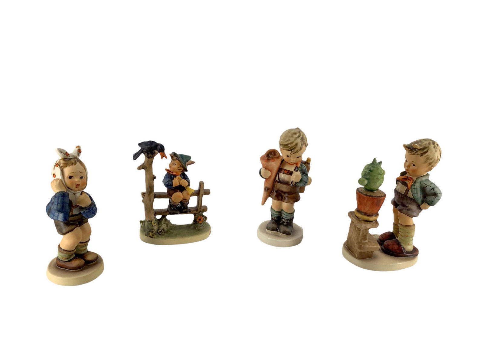 Lot of 4 Hummel figures which include "Toothache", "Little Scholar", "Mischief Maker", and (1 of 3)