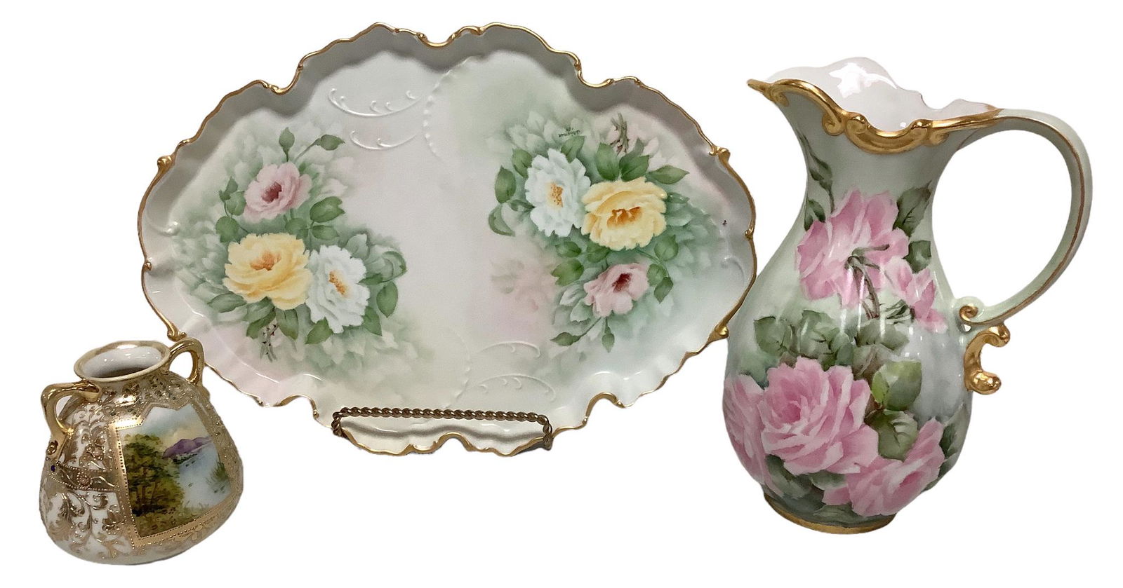 Lot of 3 floral porcelain items including an unmarked tray @ 15" wide, an unmarked pitcher w/pink (1 of 2)